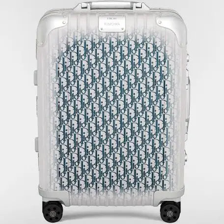 Dior Rimowa suitcases